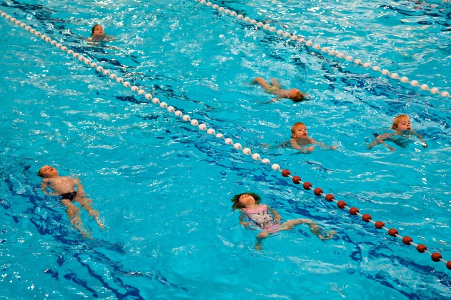 Group of Young Children during their School Swimming Lesson